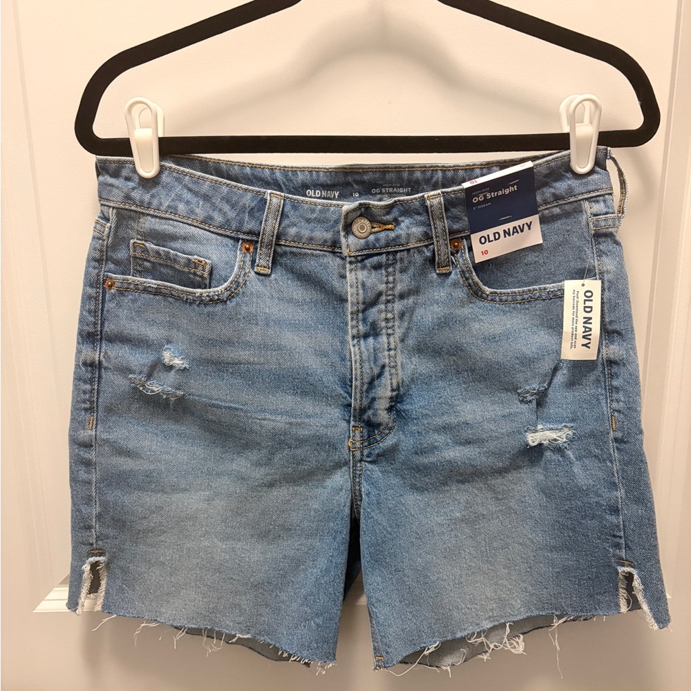 Size 10 Medium/Light Color Wash, Distressed Denim Cutoff Shorts